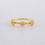Anillo Trío Flores 1.6 g / T7 Oro Amarillo 18K