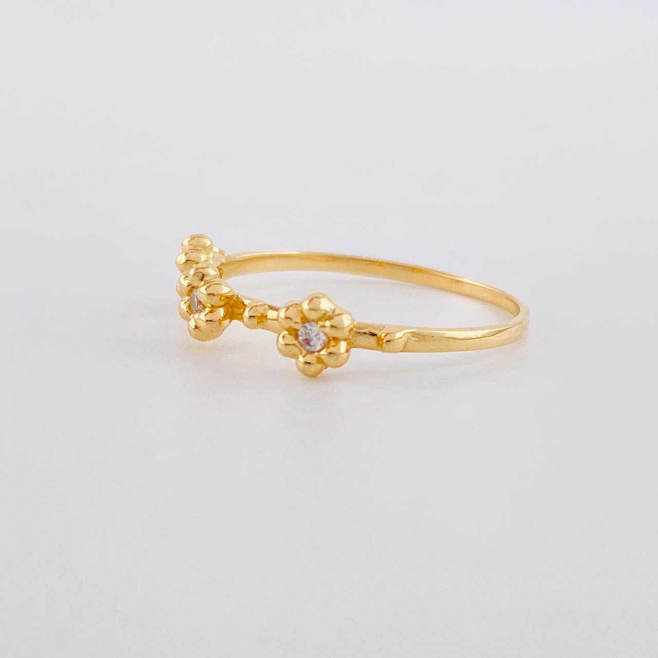 Anillo Trío Flores 1.6 g / T7 Oro Amarillo 18K