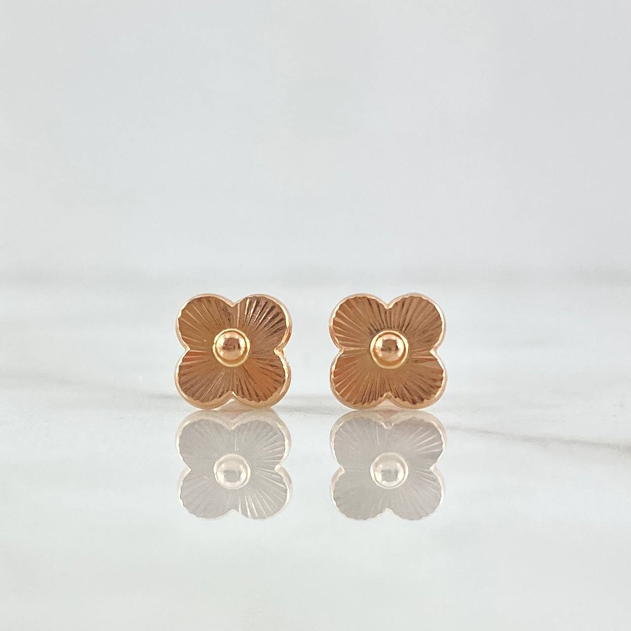 Topos Flor Rayada 0.95gr / 9mm Oro Rosa 18K