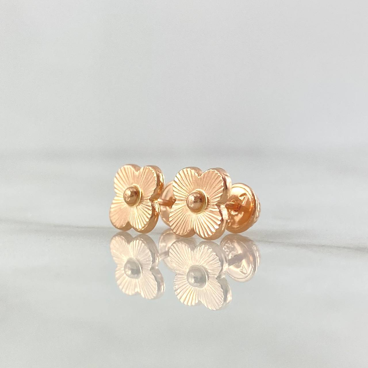 Topos Flor Rayada 0.95gr / 9mm Oro Rosa 18K