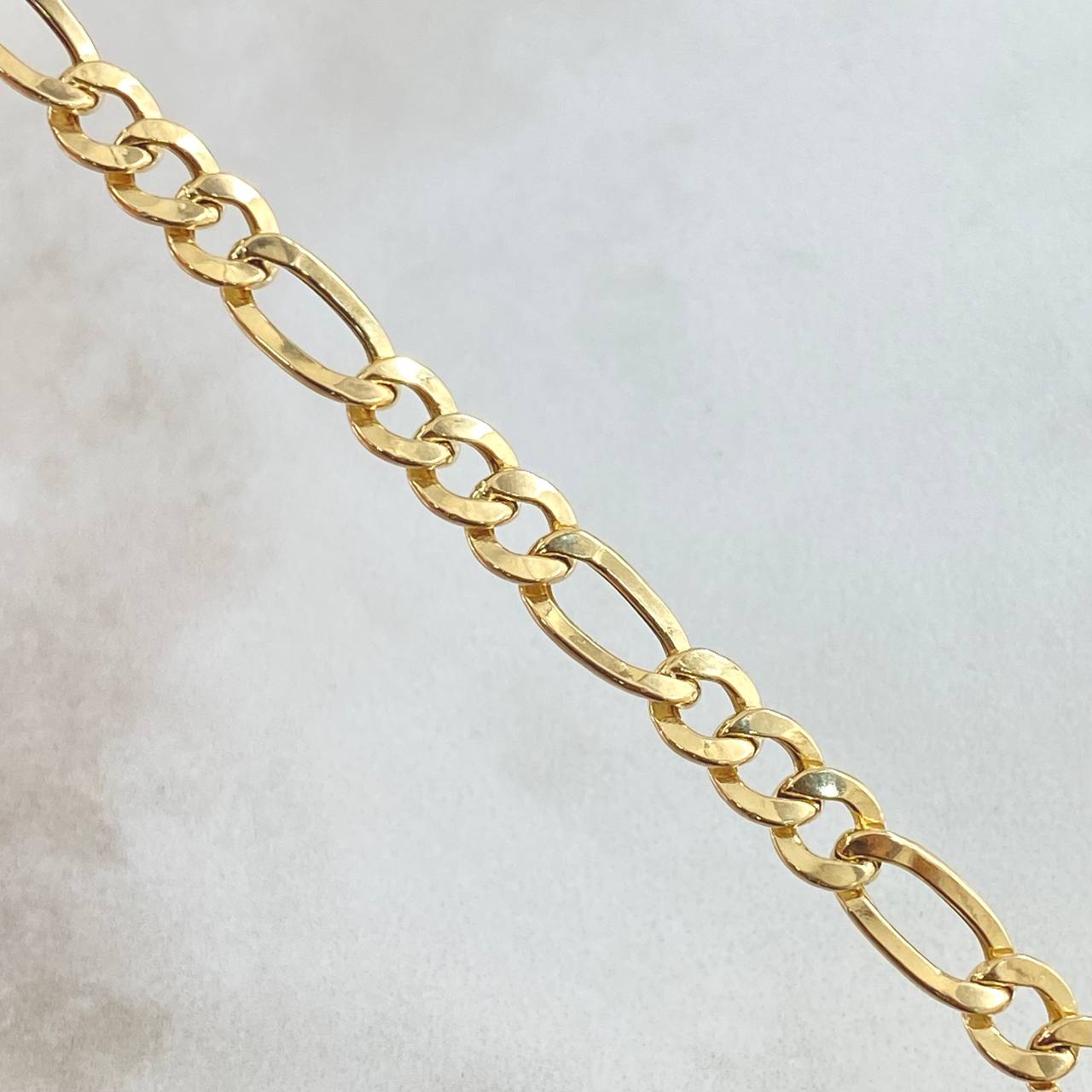Cadena Figaro 10.55gr / 60cm / +1 Oro 18K