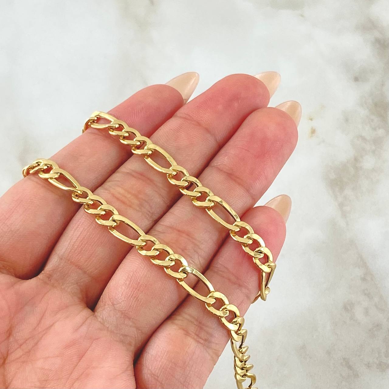 Cadena Figaro 10.55gr / 60cm / +1 Oro 18K