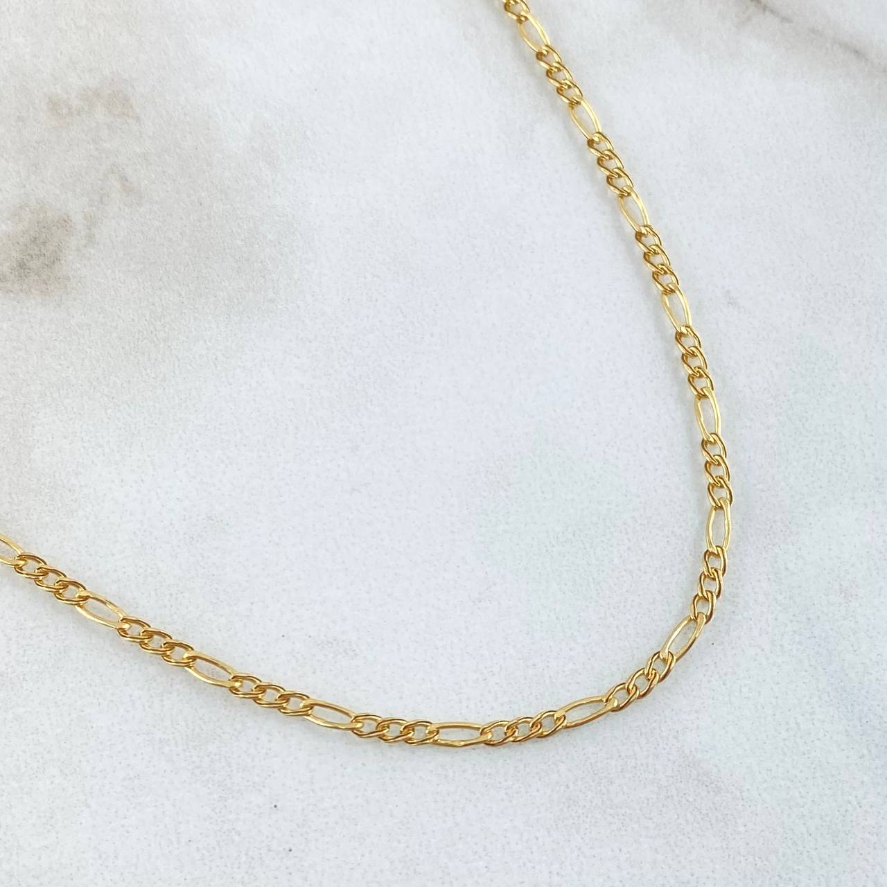 Cadena Figaro 1.35gr / 45cm / +1 Oro 18K ©