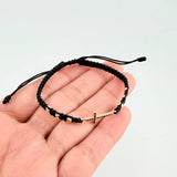 Pulsera Tejida Negra Herraje Cruz, 6 3Mm Diamantados Oro Amarillo 18K