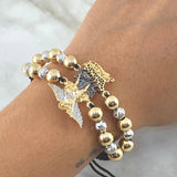 Pulsera Negra Herraje San Miguel Arcangel 11.1gr / 6mm - 7mm Bolas Lisas - Diamantadas 20 Und Oro Amarillo 18K ©