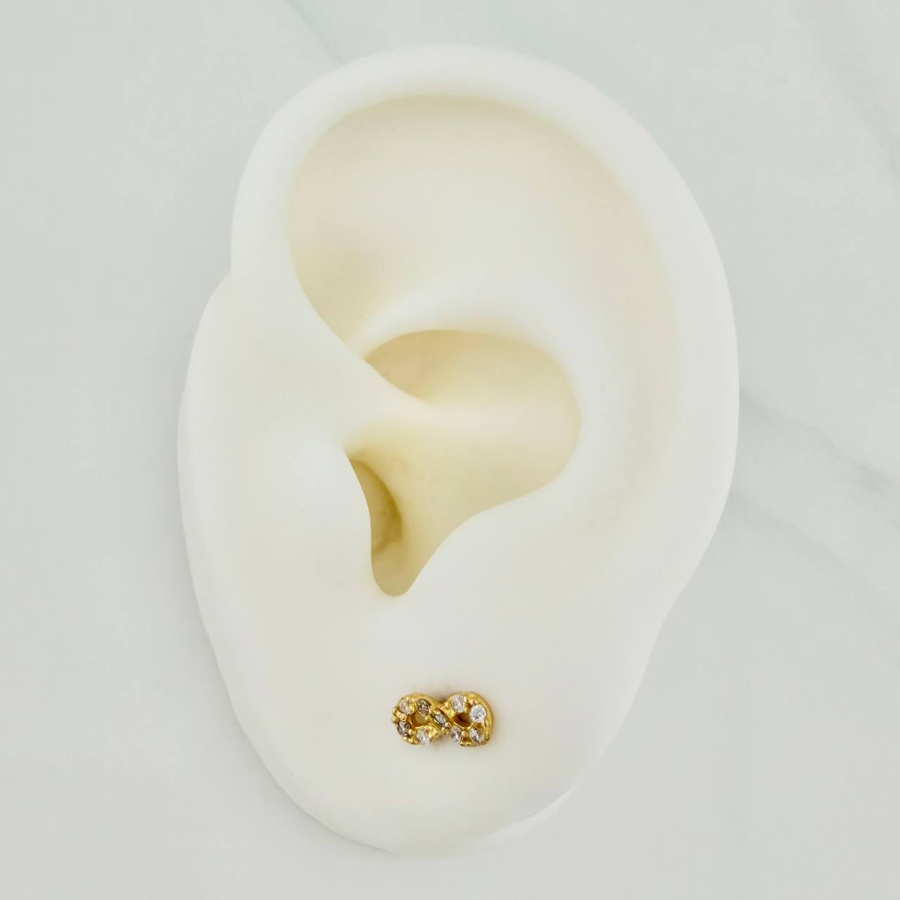 Topos Infinito 0.85gr / 7.2mm Oro Amarillo 18K