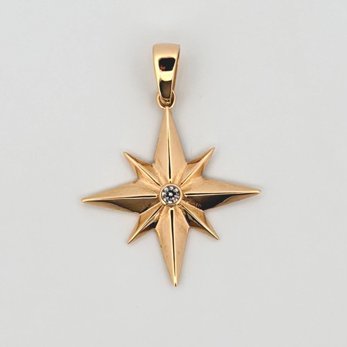 Dije Estrella 8 Puntas 2.45gr / 3.3cm / Oro Amarillo 18K