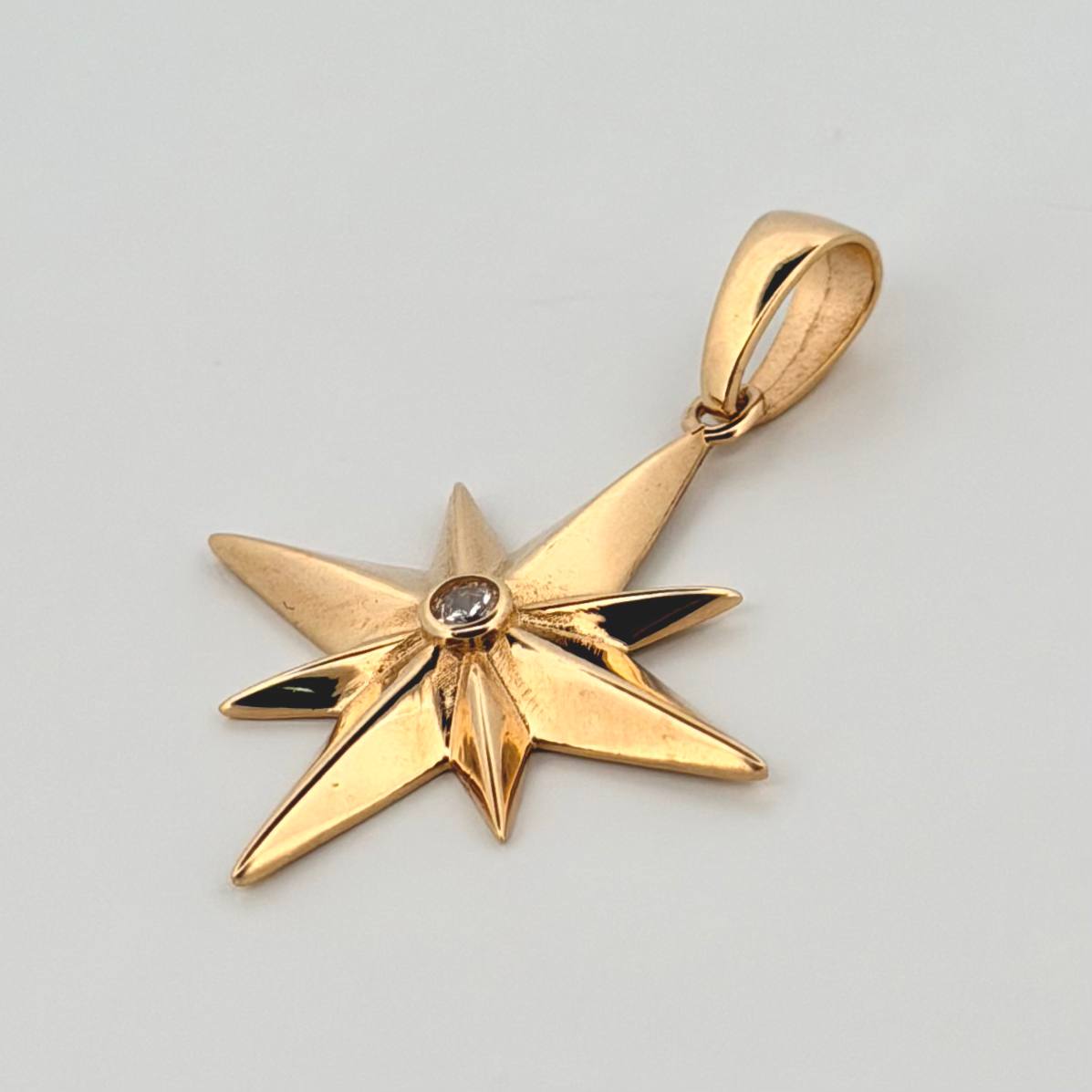 Dije Estrella 8 Puntas 2.45gr / 3.3cm / Oro Amarillo 18K