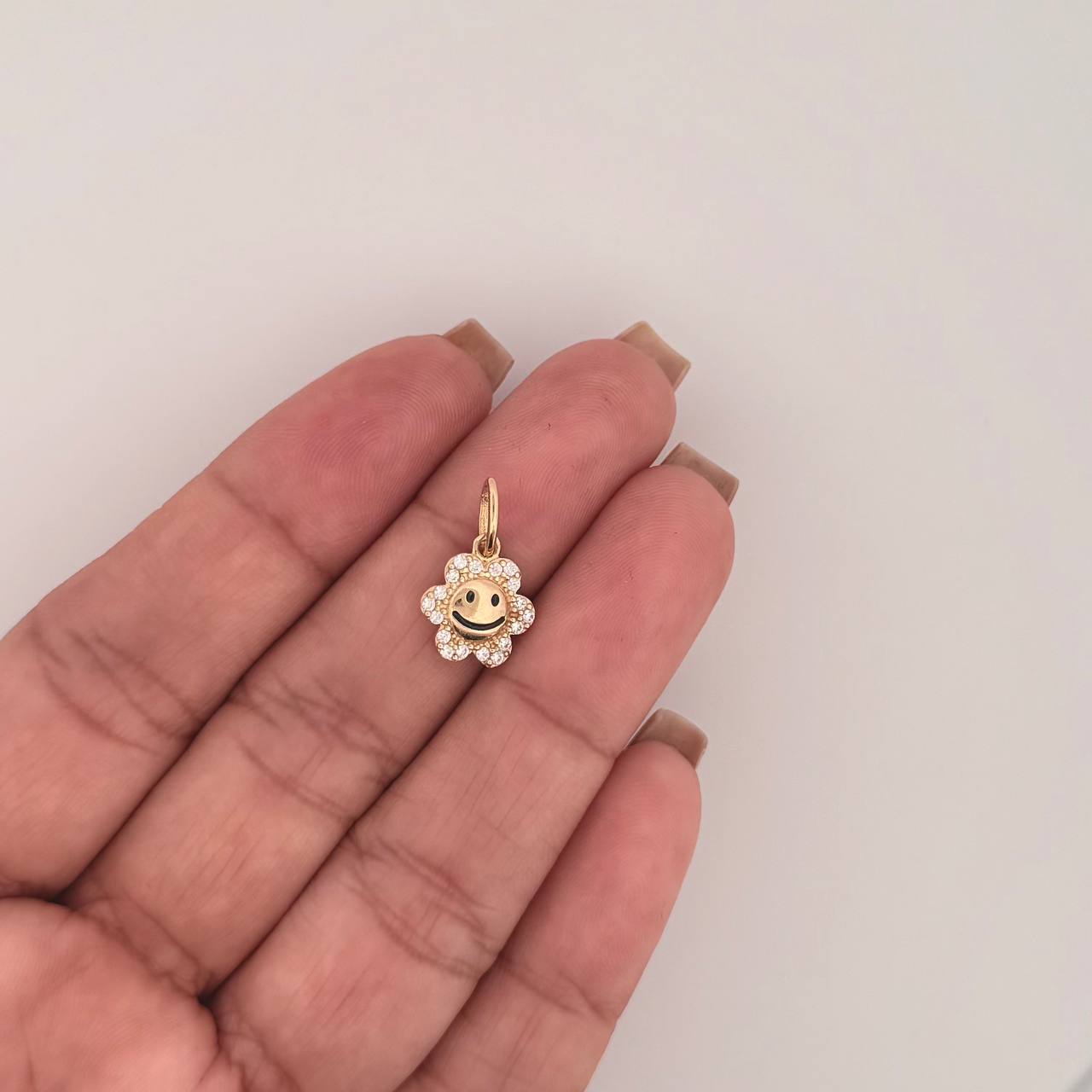 Dije Flor Animado 1.2gr / 1.8cm / Oro Amarillo 18K