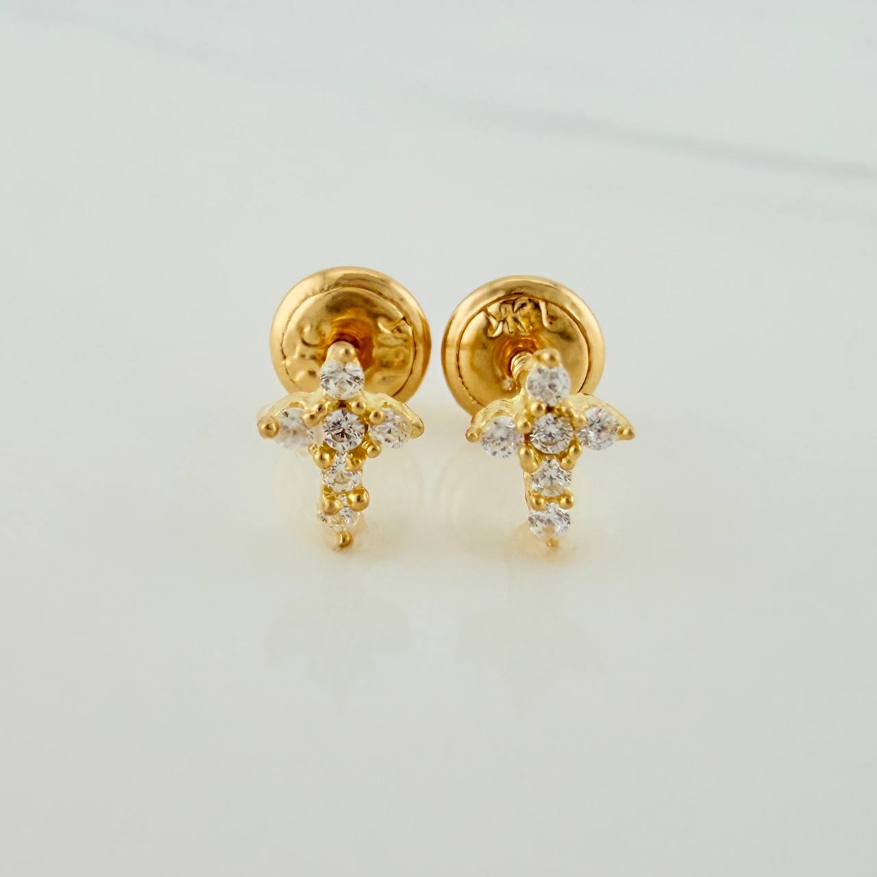Topos Cruz 0.8gr / 4.5mm Oro Amarillo 18K