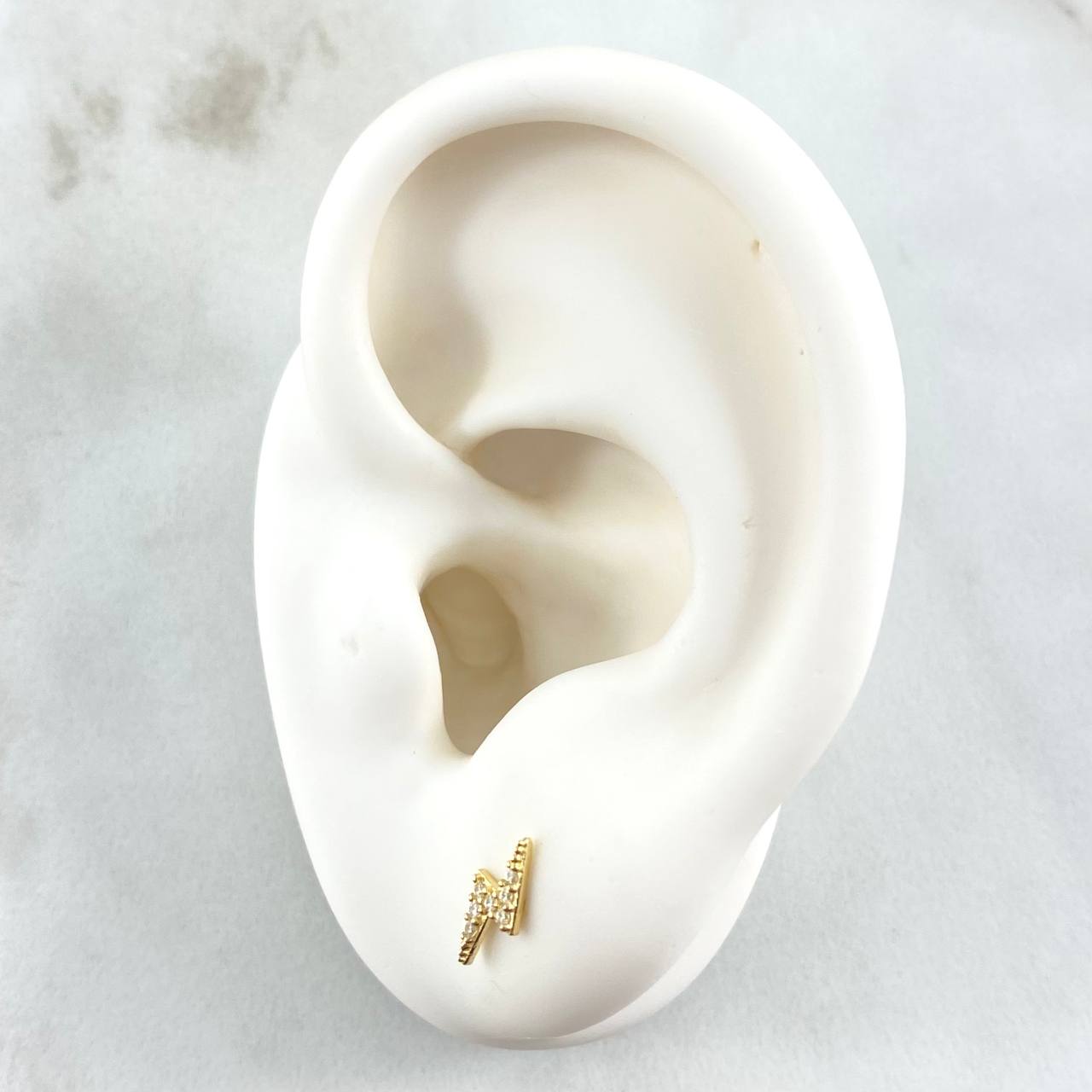 Topos Rayo 0.7gr / 9mm Circones Blancos Oro Amarillo 18K ©