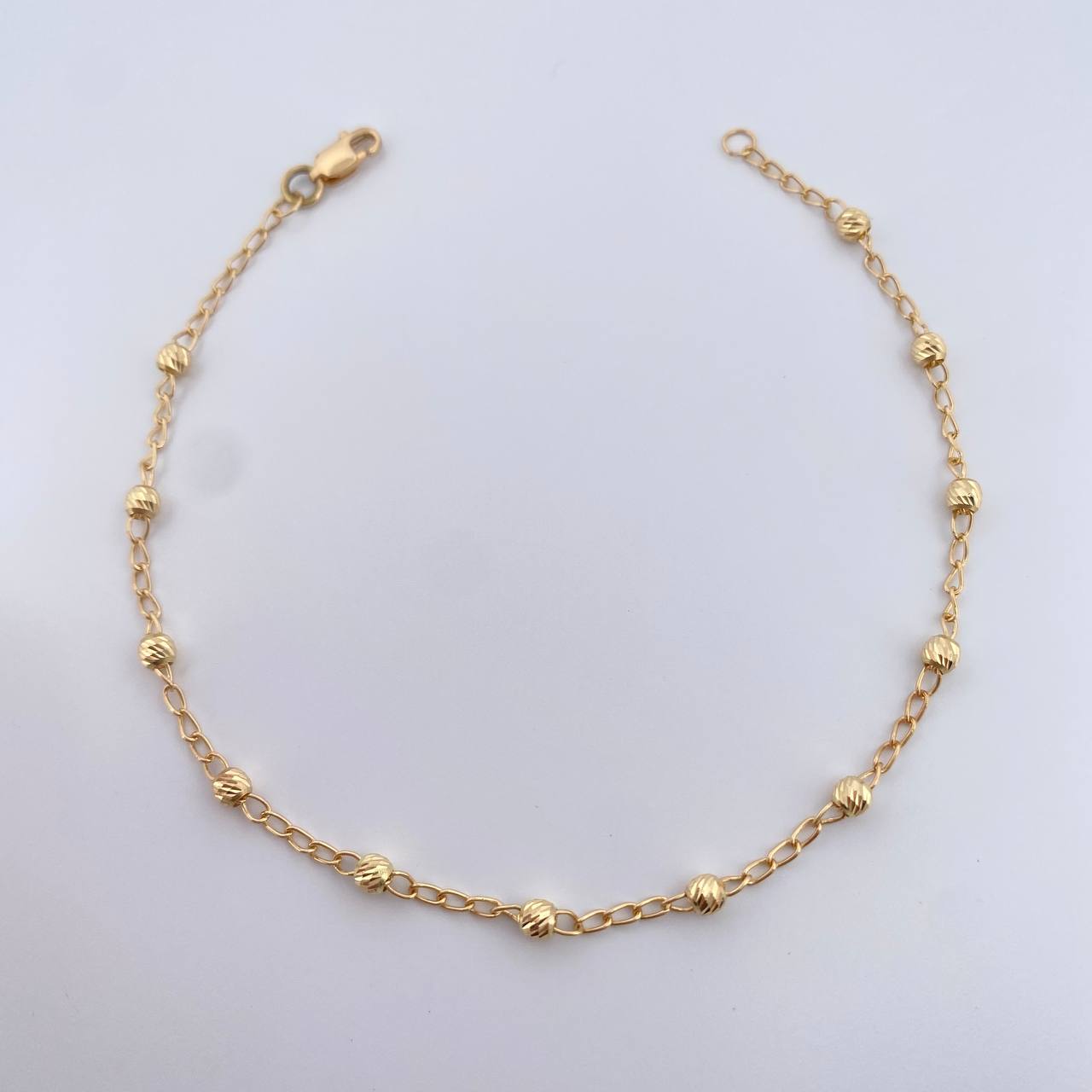 Pulso Tipo Militar Aro Seguido 1.8gr / 19.5cm / 3mm Bolas Diamantadas Oro Amarillo 18K &