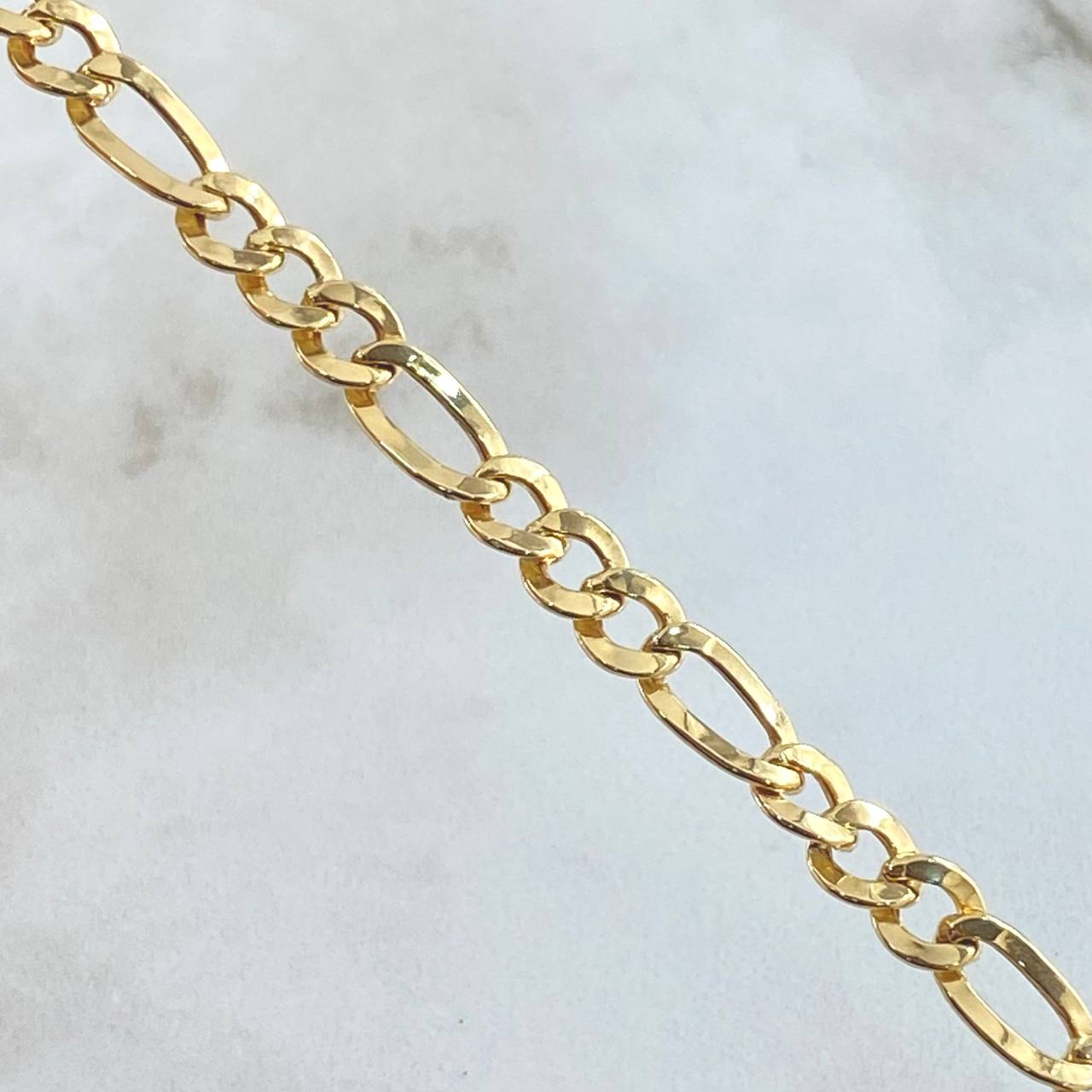Cadena Figaro 12.25gr / 70cm / Oro Amarillo +1 18K ©
