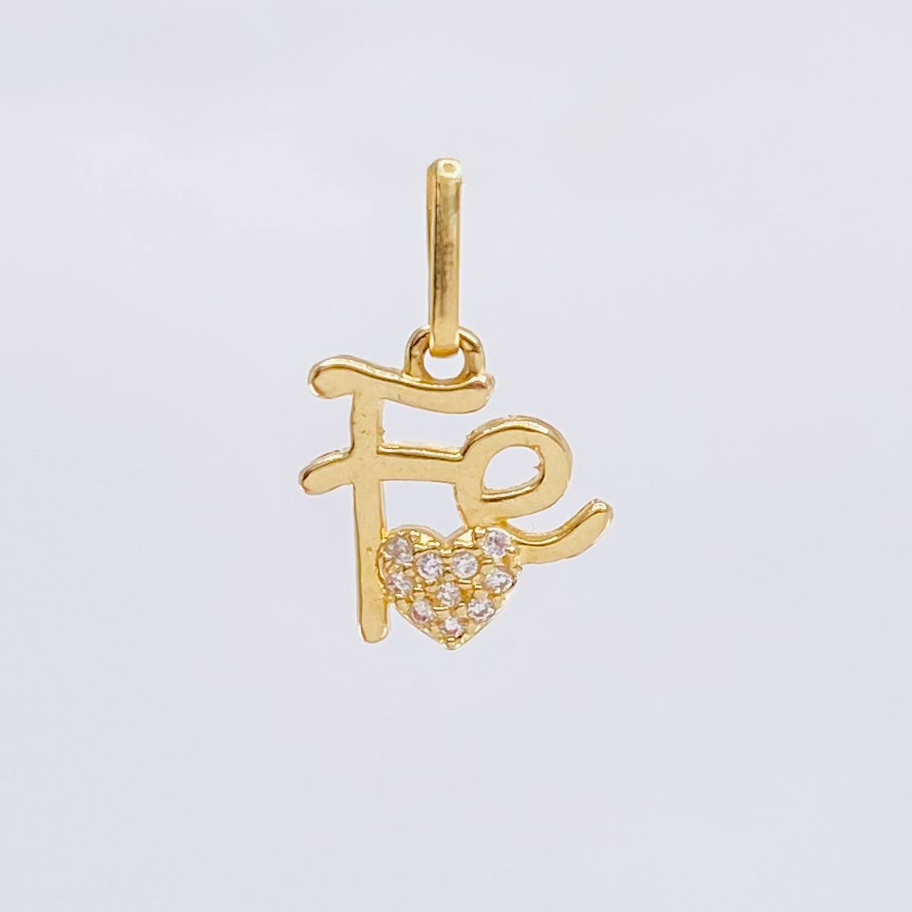 Dije Fe Corazon Tupido 1.2 g / 1.7 cm Oro Amarillo 18K