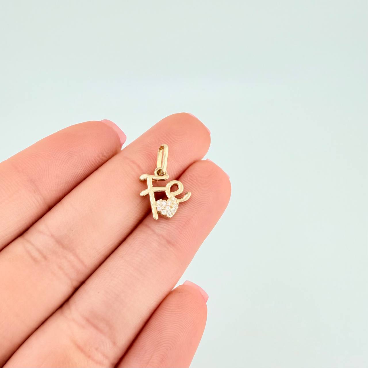 Dije Fe Corazon Tupido 1.2 g / 1.7 cm Oro Amarillo 18K