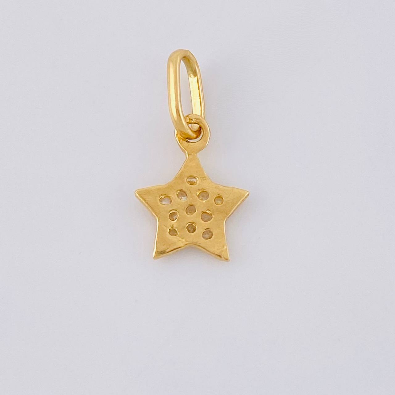 Dije Estrella 0.55 g / 1.5 cm Oro Amarillo 18K
