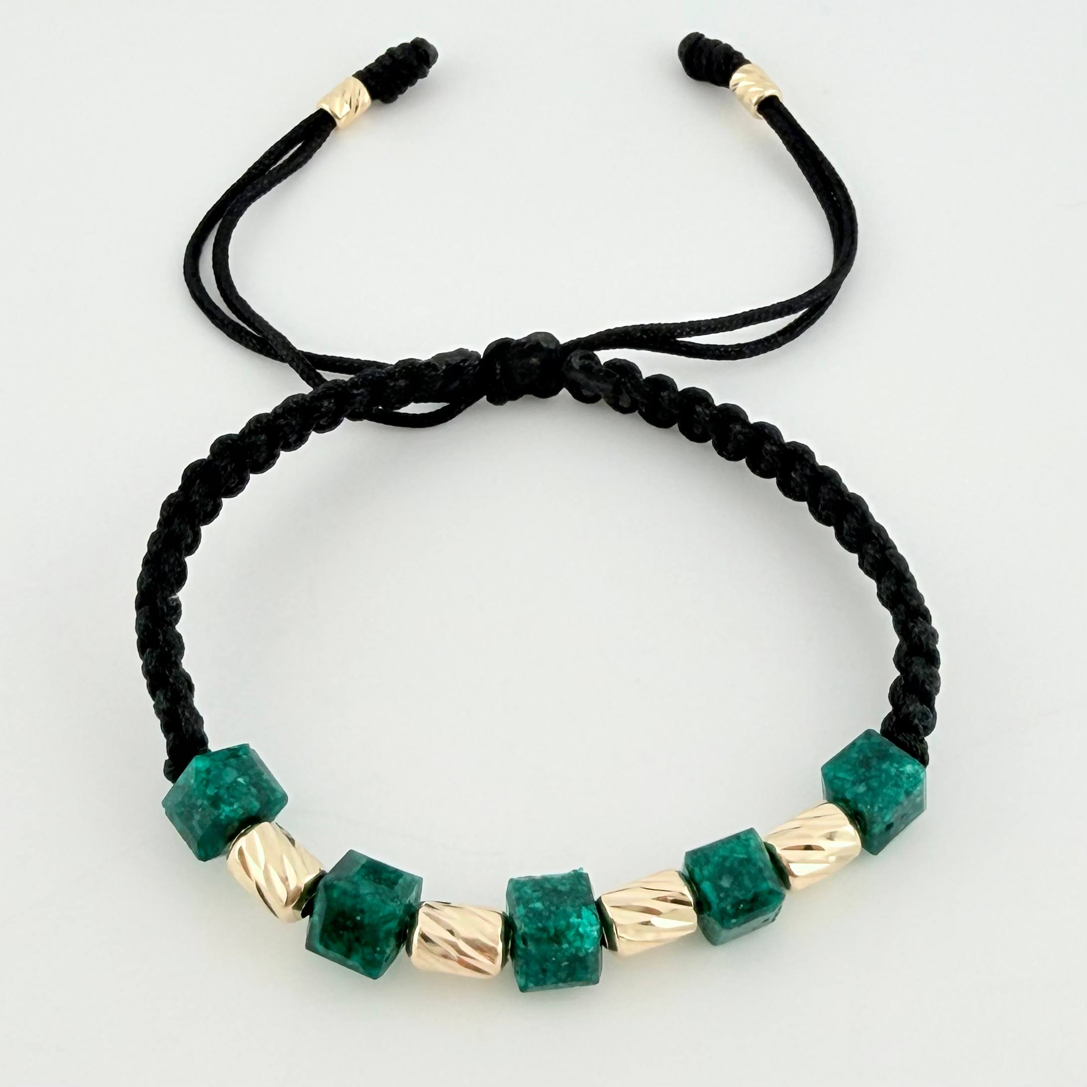 Pulsera Negra Morralla Cubica 4mm Cilindros 6und / Oro Amarillo 18K ©