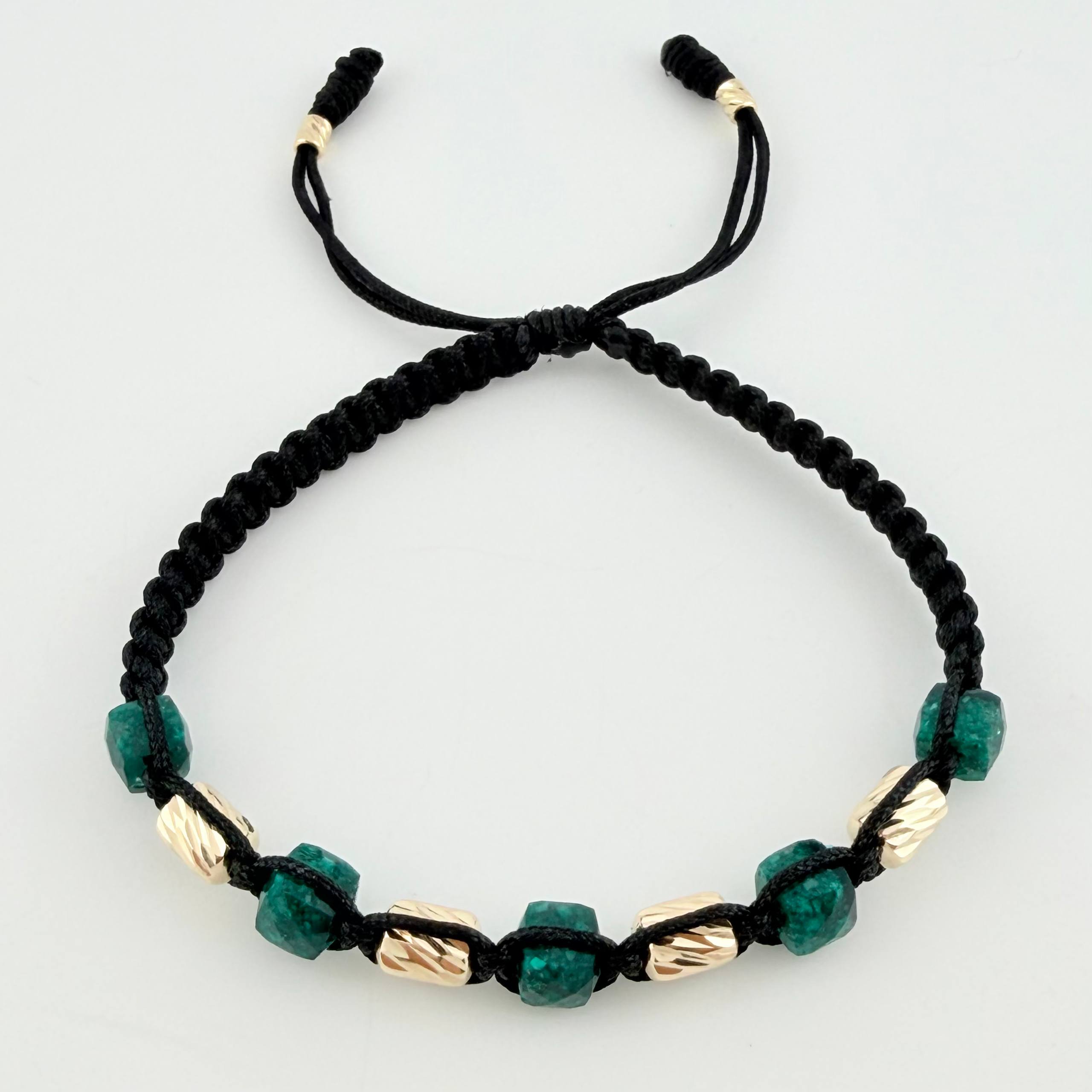 Pulsera Negra Morralla Cubica 5mm Cilindros 6und / Oro Amarillo 18K ©