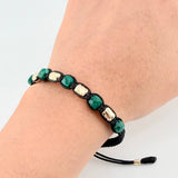 Pulsera Negra Morralla Cubica 5mm Cilindros 6und / Oro Amarillo 18K ©