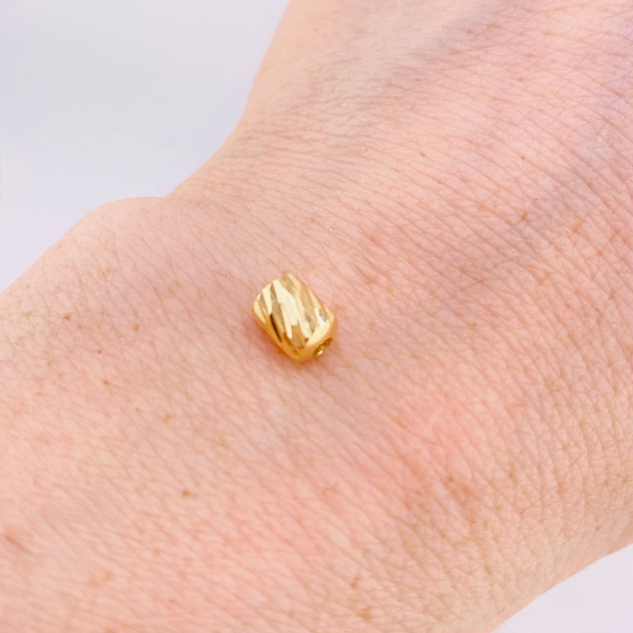 Herraje Cilindro 0.25gr / 7mm Oro Amarillo 18K ©