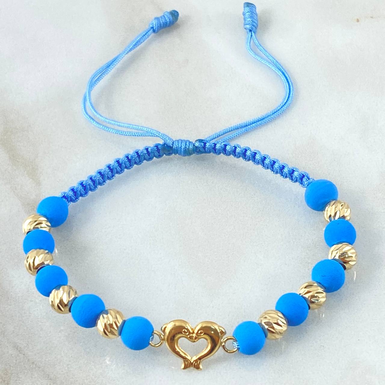 Pulsera Azul Celeste Herraje Delfines 1.65gr / Oro Amarillo 18K *
