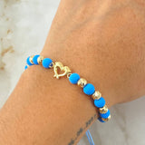 Pulsera Azul Celeste Herraje Delfines 1.65gr / Oro Amarillo 18K *