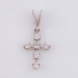 Dije Mini Cruz Diamantes 8pts 0.35gr / 1.5cm / Oro Blanco 18K