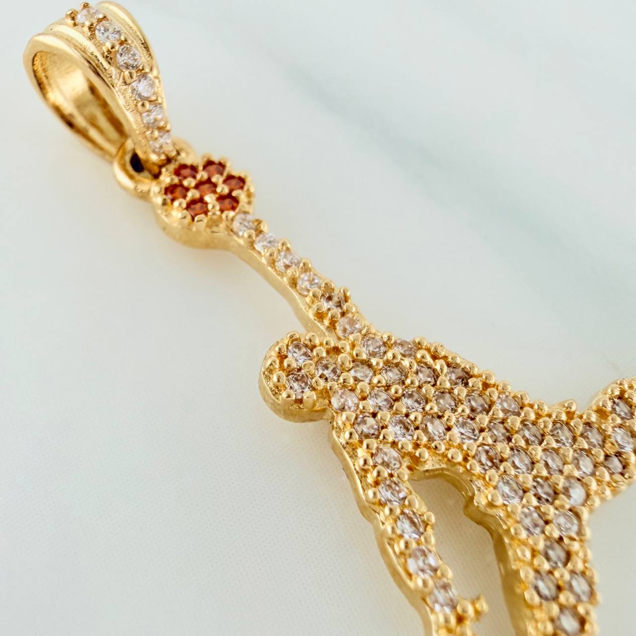 Dije Jugador 2.7gr / 3.7cm / Oro Amarillo 18K $