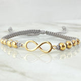 Pulsera Gris Herraje Infinito 2.1gr / Oro Amarillo 18K ©