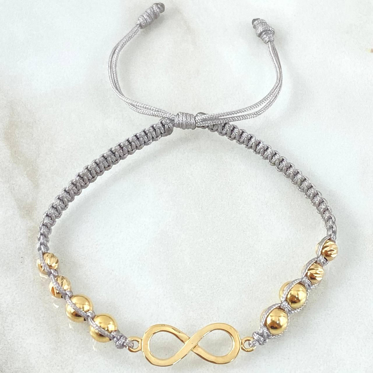 Pulsera Gris Herraje Infinito 2.1gr / Oro Amarillo 18K ©