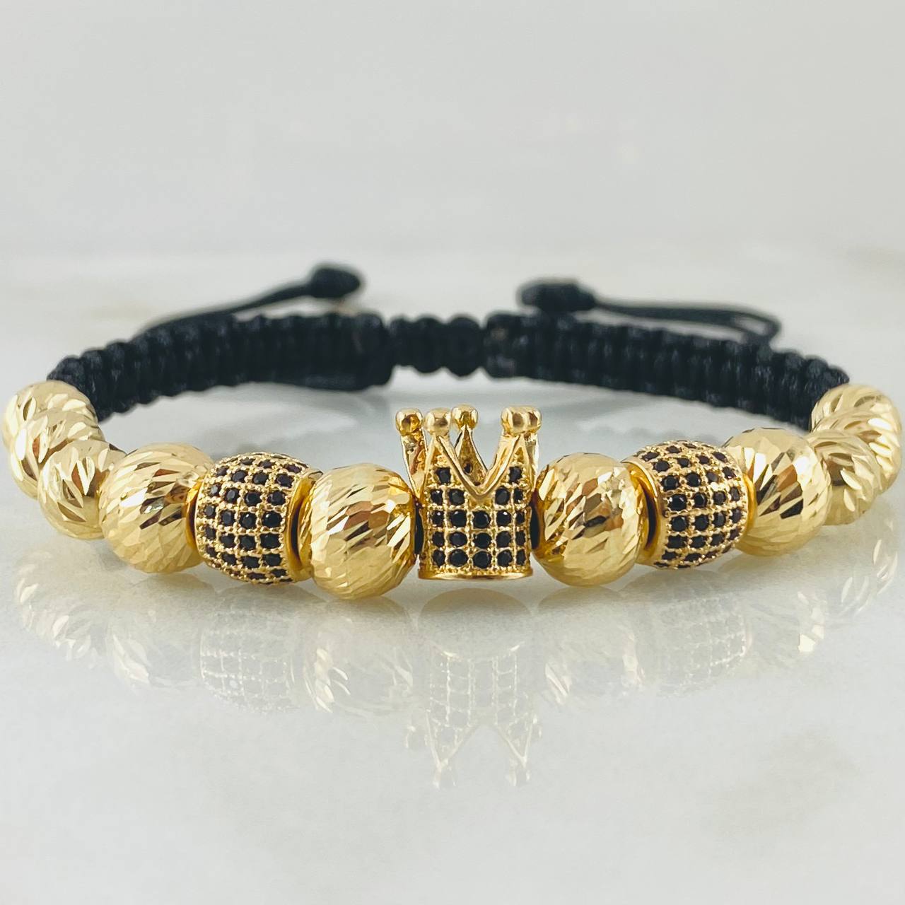 Pulsera Negra Herraje Corona 7.4gr / Oro Amarillo 18K ©