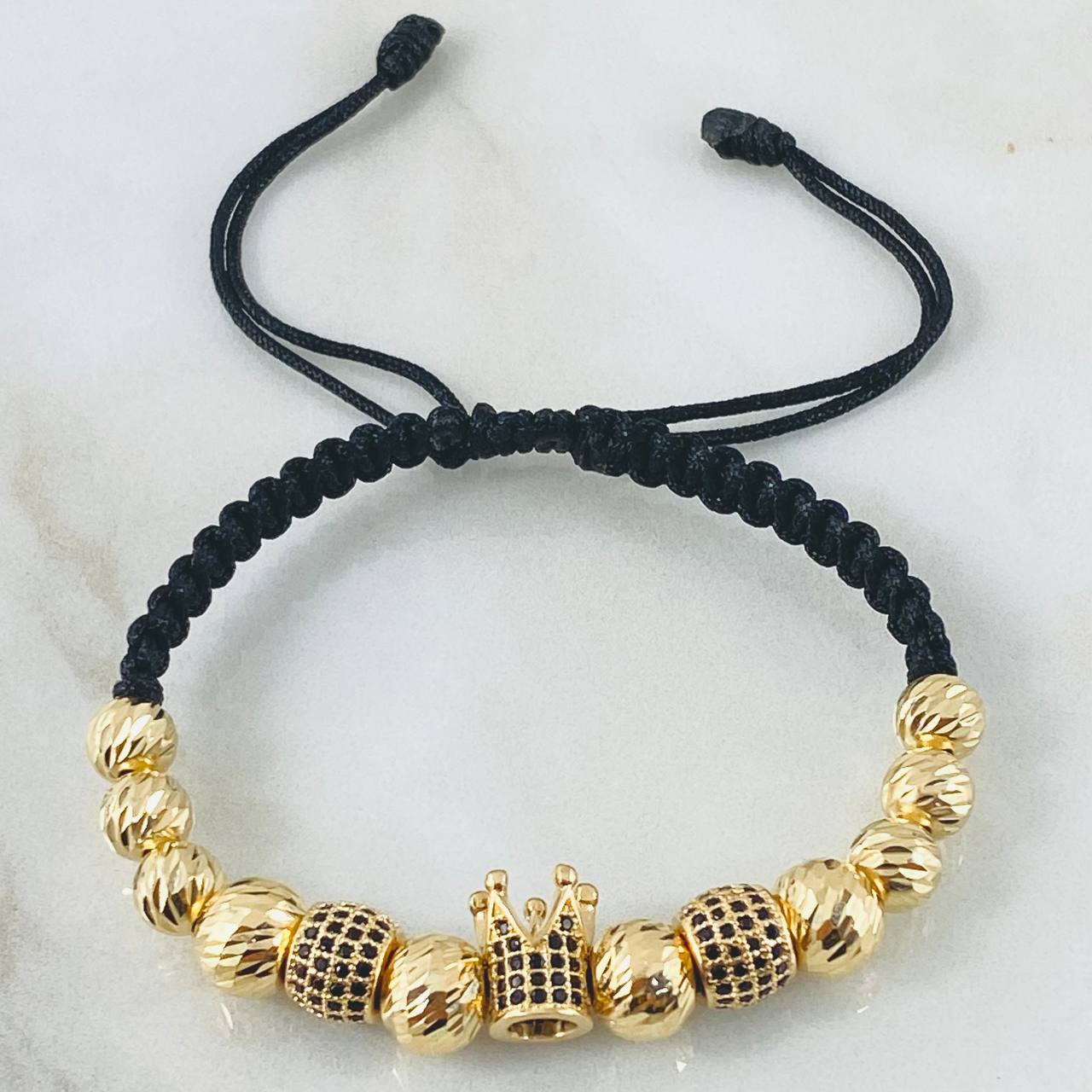 Pulsera Negra Herraje Corona 7.4gr / Oro Amarillo 18K ©