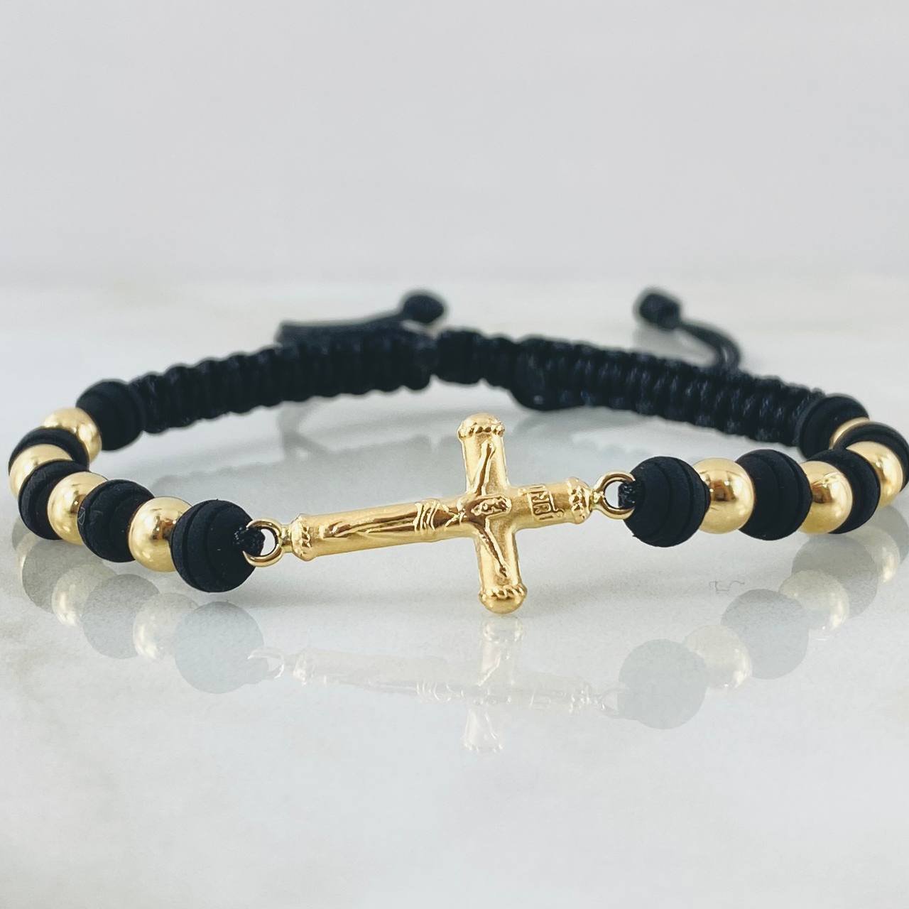 Pulsera Negra Herraje Cruz 2gr / Oro Amarillo 18K ©