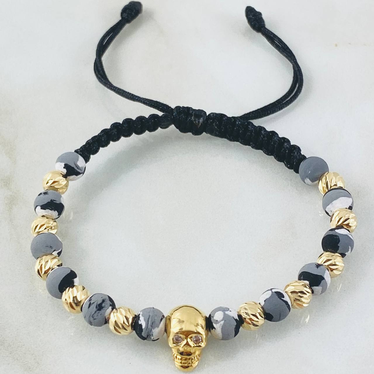 Pulsera Negra Herraje Calavera 3.35gr / Oro Amarillo 18K ©