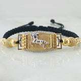 Pulsera Negra Herraje Caballo 6.45gr / Dos Oros Amarillo Blanco 18K ©