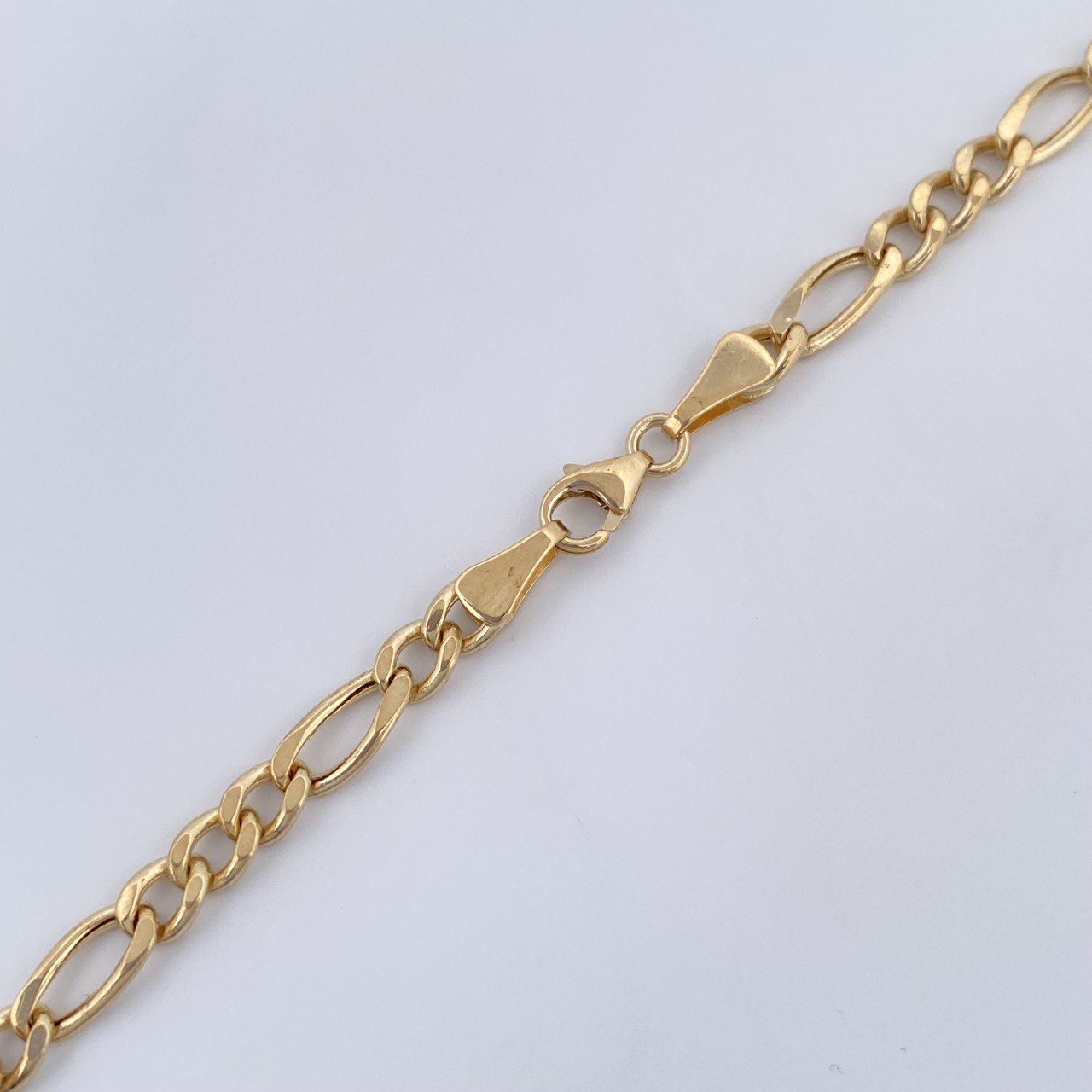 Cadena Figaro 9.7gr / 60cm / Oro Amarillo +1 18K &