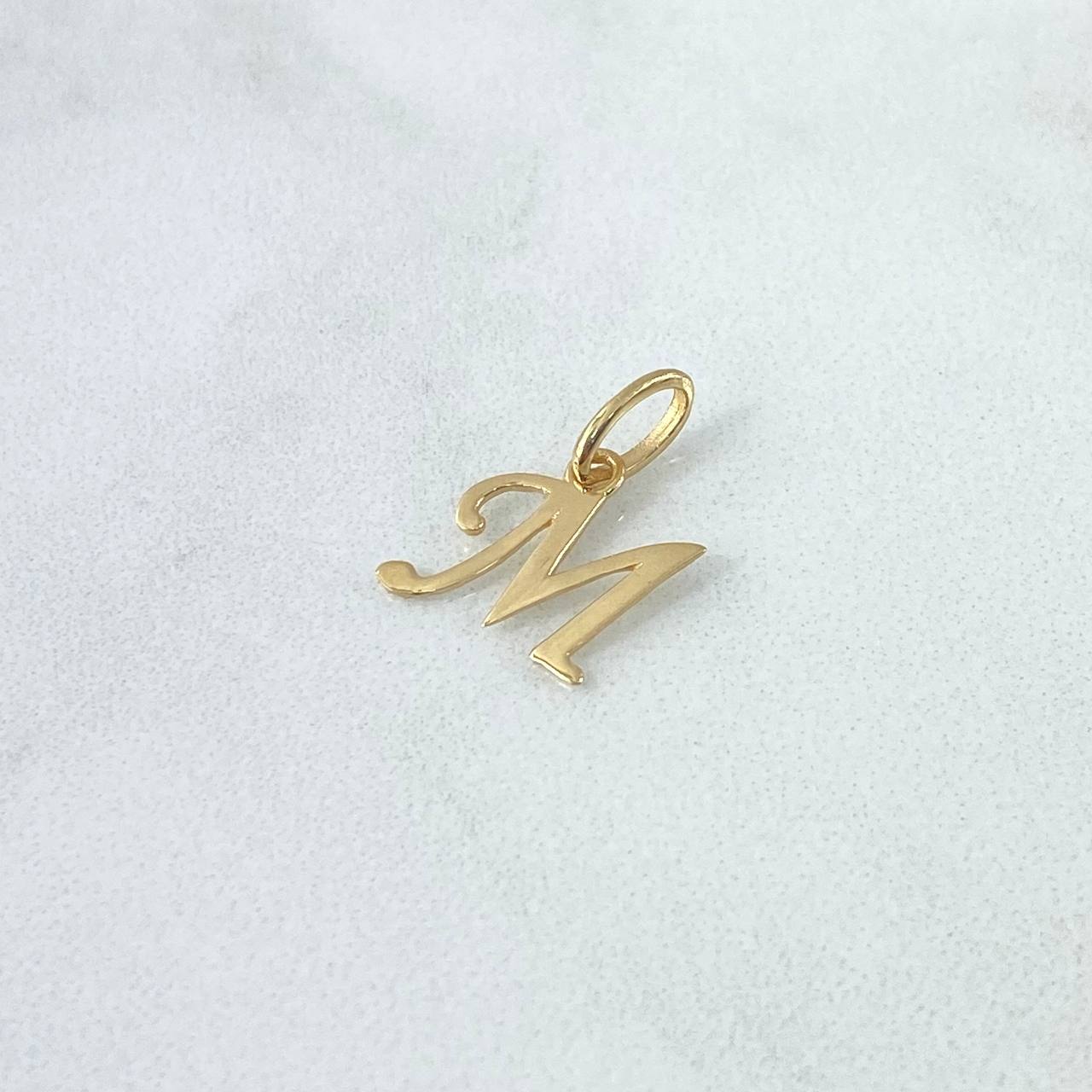Dije Letra M Cursiva 0.5gr / 1.7cm / Oro Amarillo 18K ©