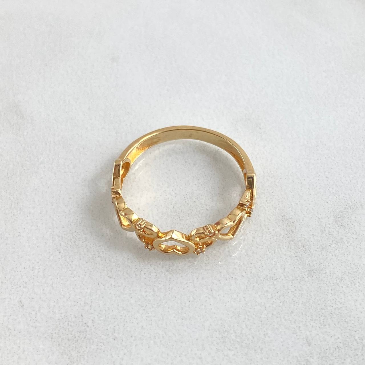 Anillo Hilera Corazones 2.05gr / T7 / Circones Blancos Oro Amarillo 18K