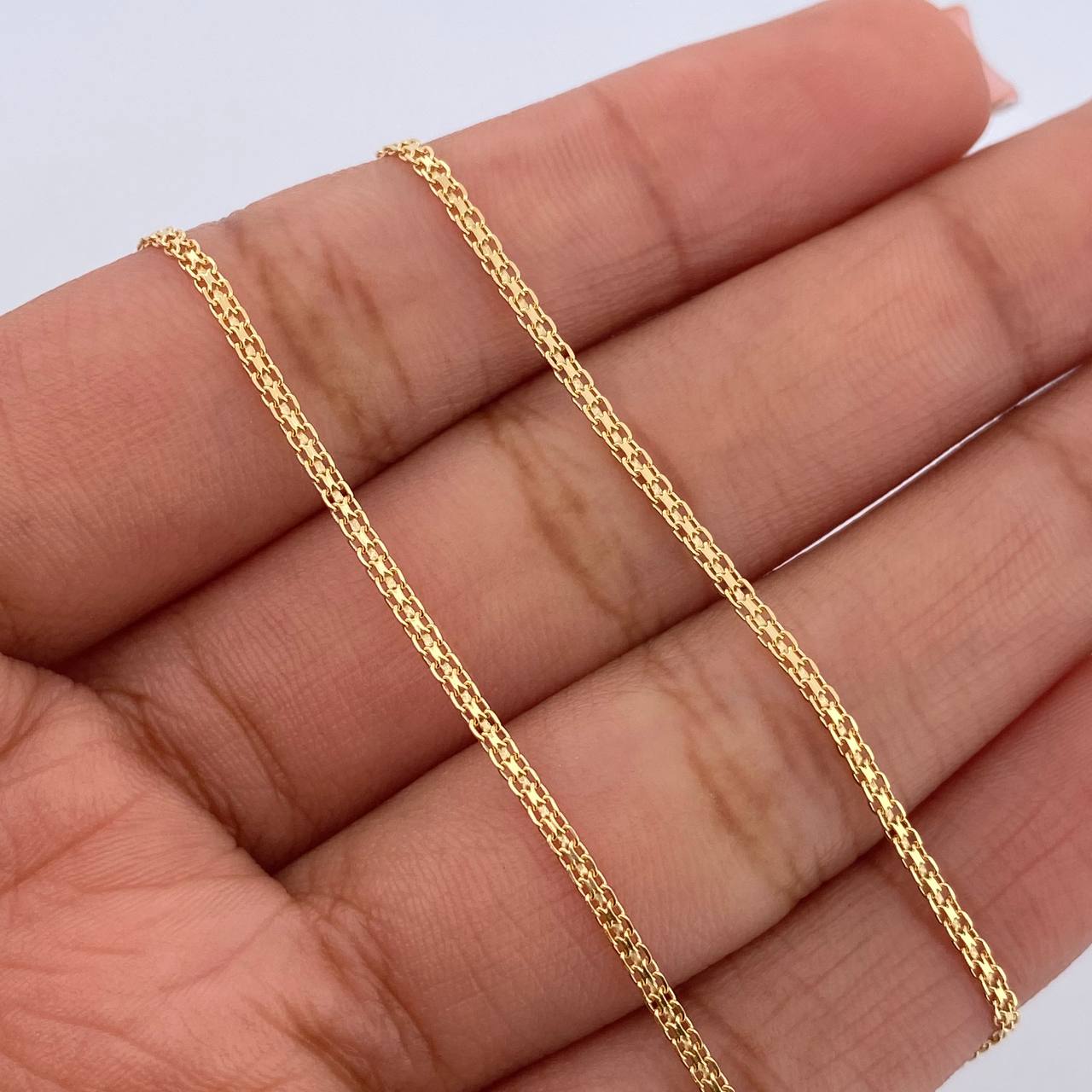 Cadena China 2.6gr / 50.4cm / 1.2mm Oro Amarillo +1 18K $
