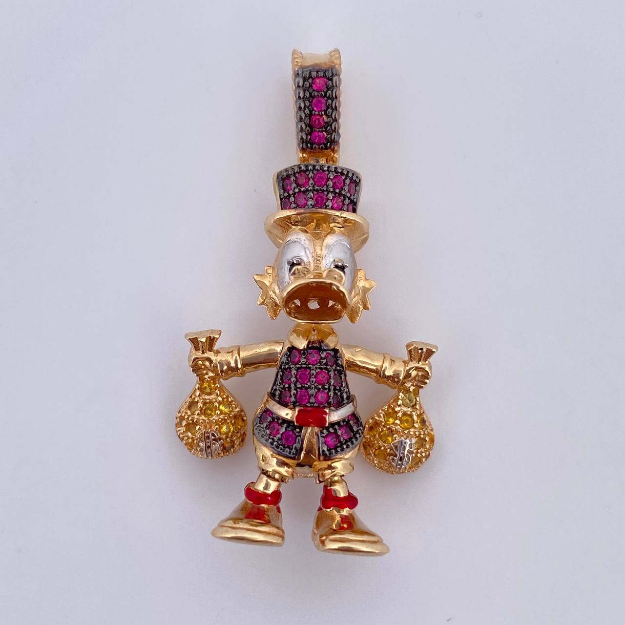 Dije Pato Bolsas Dinero 5.85gr / 3.4cm / Tres Oros 18K &