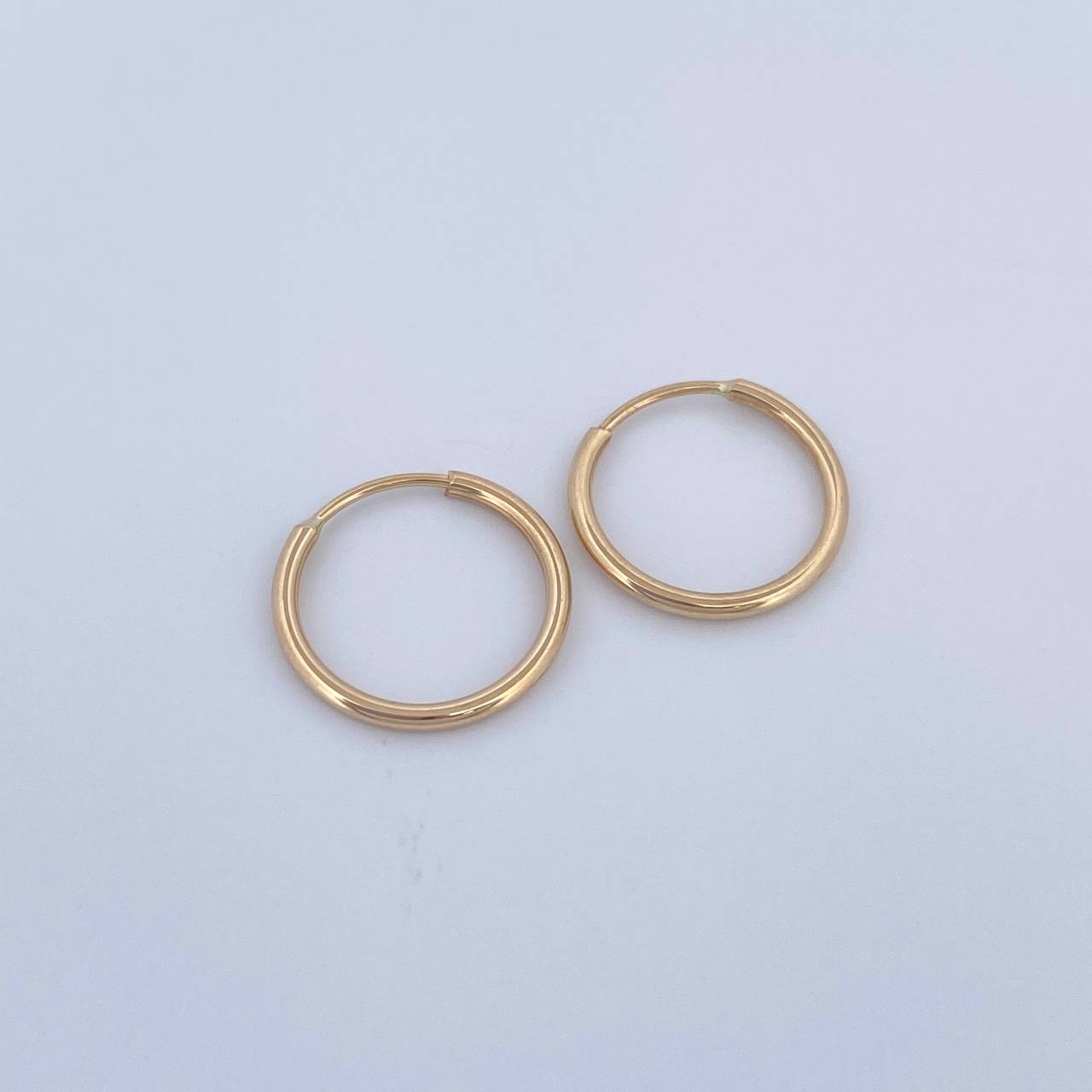 Candongas Aro 0.65gr / 1.2cm / Oro Amarillo 18K &