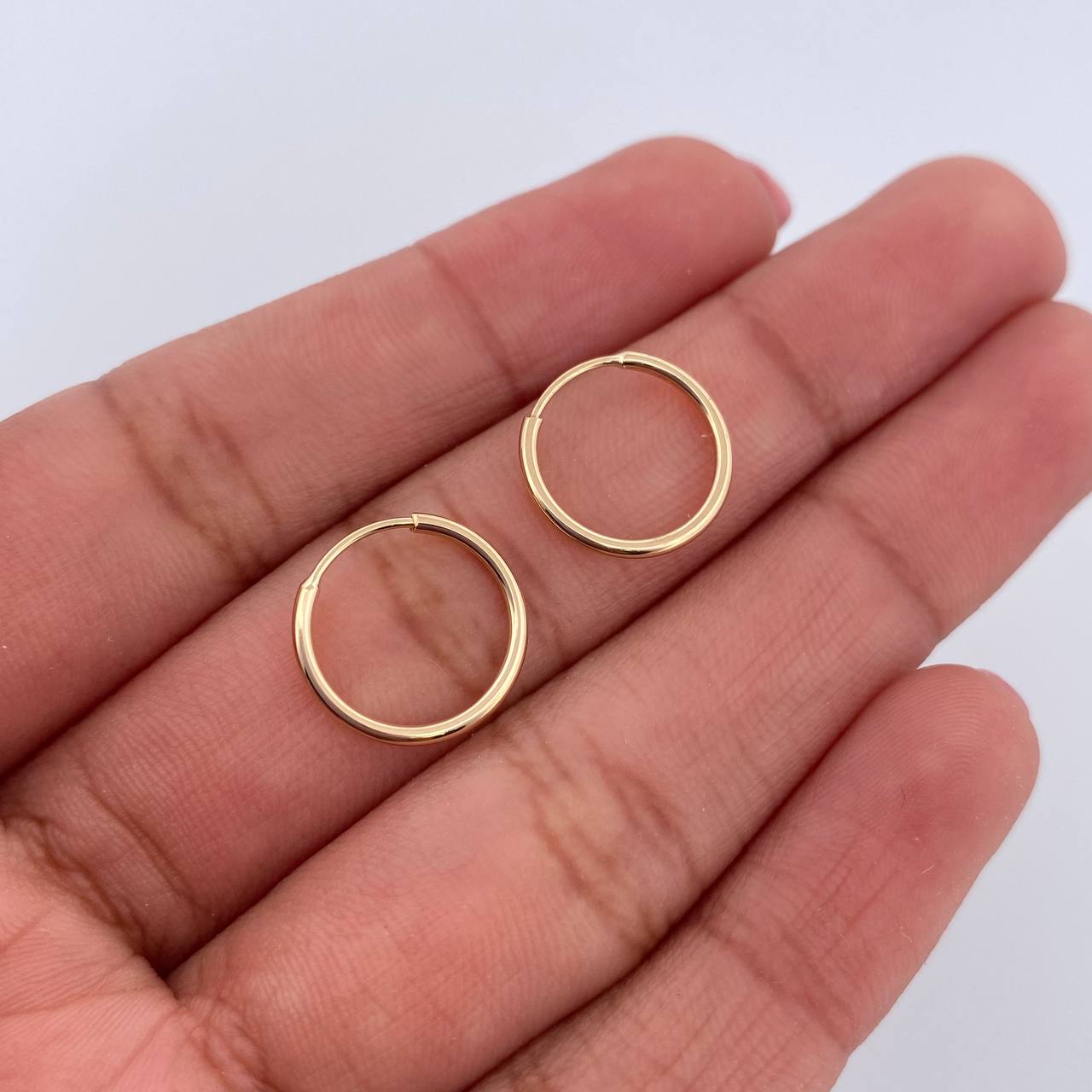 Candongas Aro 0.65gr / 1.2cm / Oro Amarillo 18K &