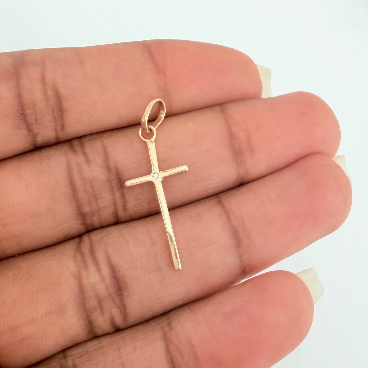 Dije Cruz 0.65gr / 2.7cm / Oro Amarillo 18K %