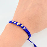 Pulsera Azul Bolas Pentatonicas 5und / 4mm-6mm Oro Amarillo 18K  (A.C)