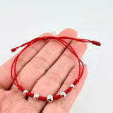 Pulsera Roja Secuencia Lisa 5und / 3mm-5mm Oro Blanco 18K ©