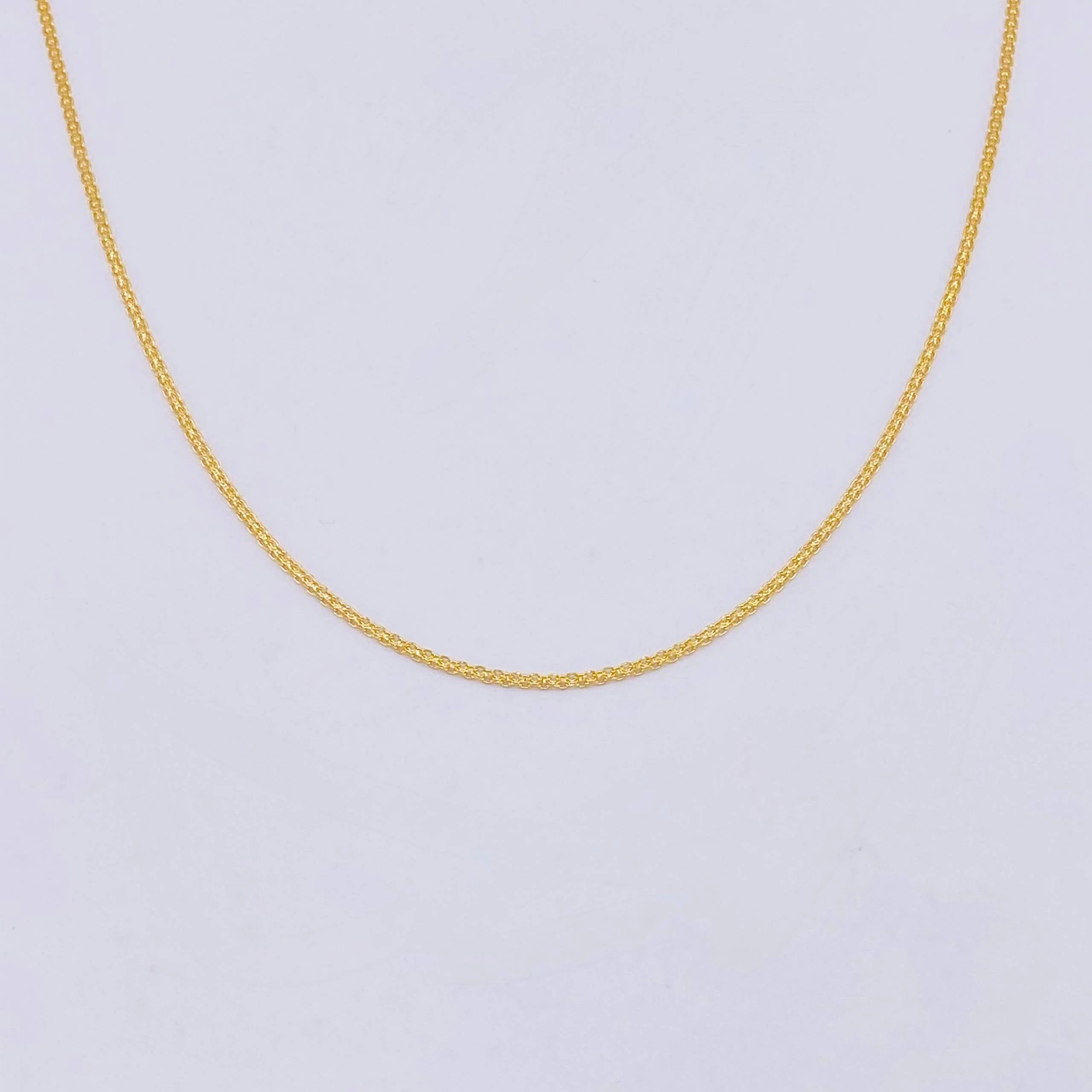 Cadena China 2.1g / 60cm / 1.05mm Oro Amarillo 18K