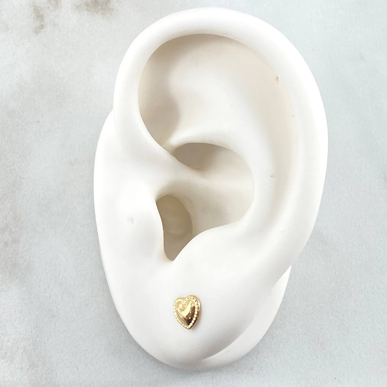Topos Corazon Bordeado 0.5gr / Oro Amarillo 18K