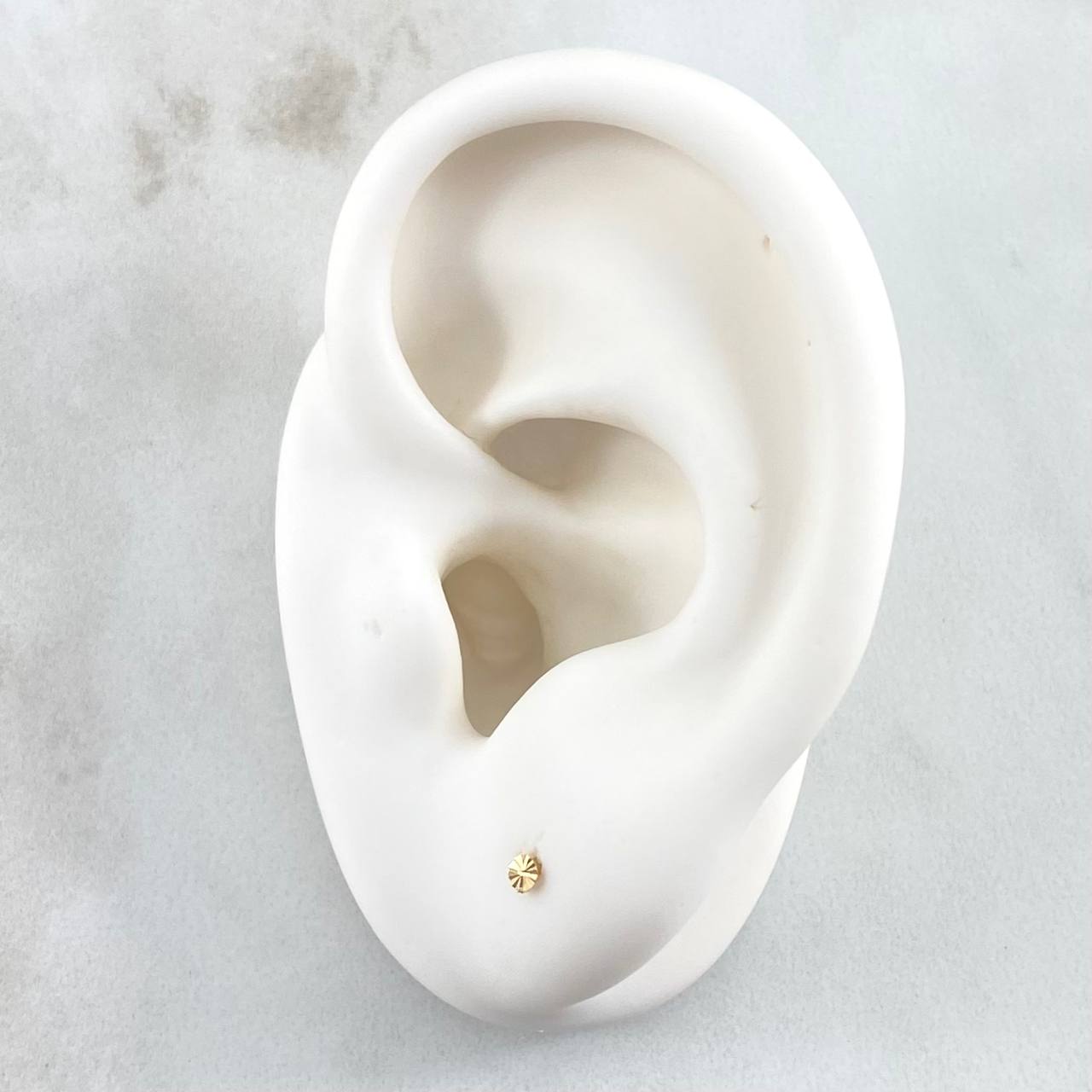 Topos Circulo Plano 0.4gr / Oro Amarillo 18K ©