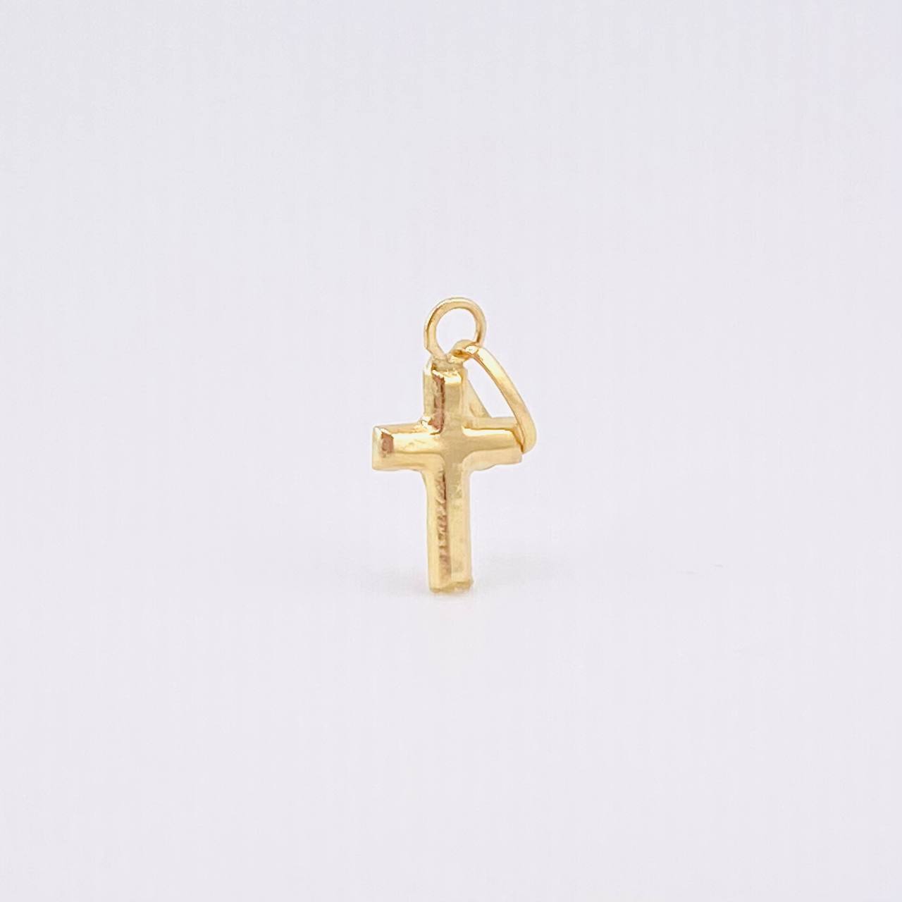 Dije Cruz Plana 0.3gr / 1.6cm / Oro Amarillo 18K *