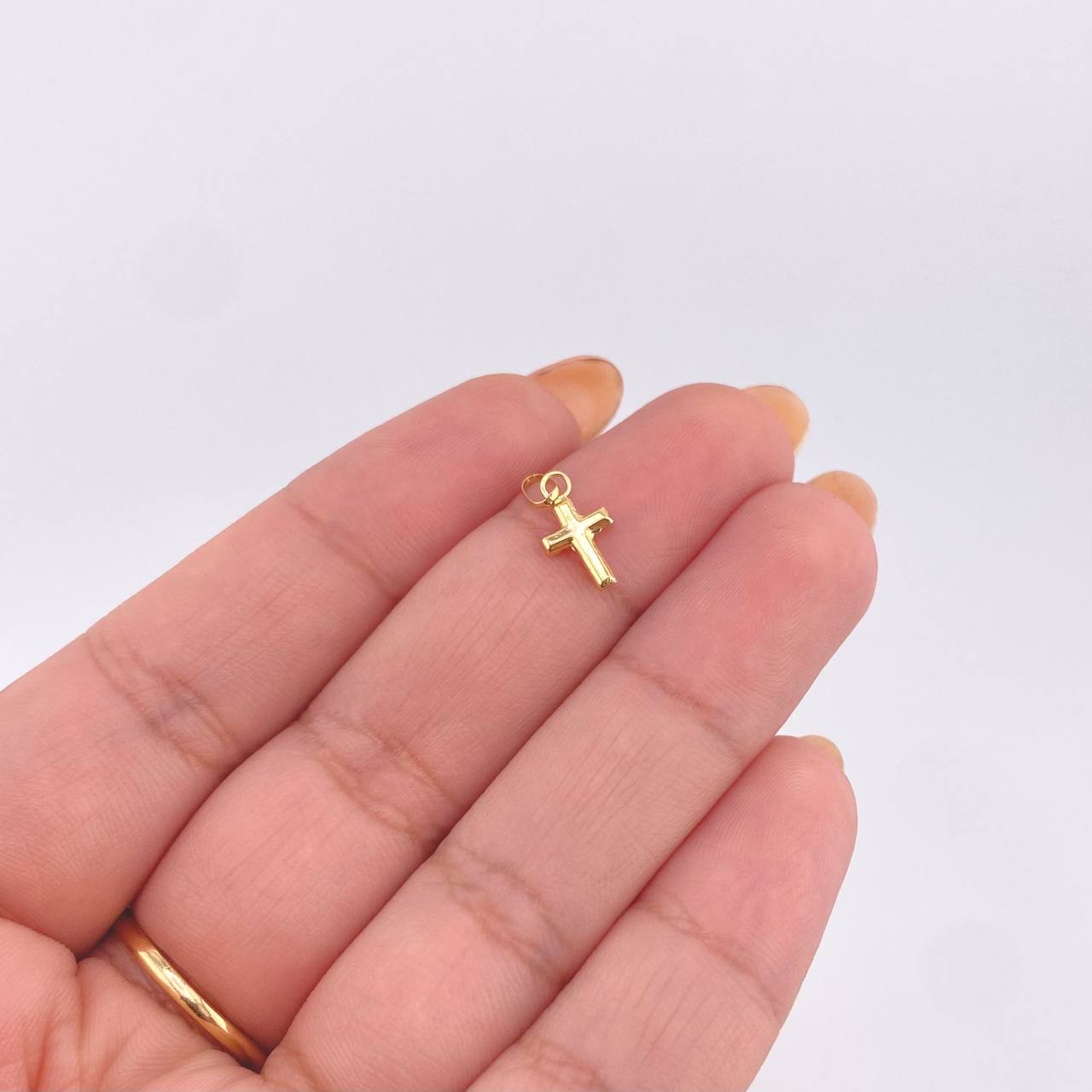 Dije Cruz Plana 0.25gr / 1.6cm / Oro Amarillo 18K ©